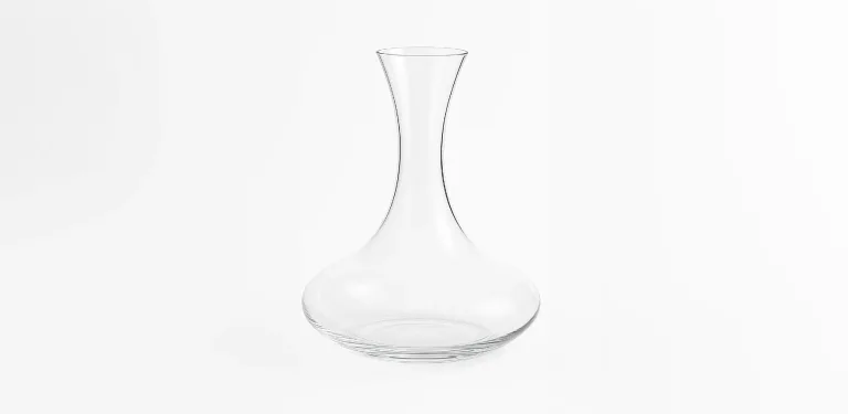 Gently pour the wine down the side of the decanter to maximize aeration and preserve clarity.